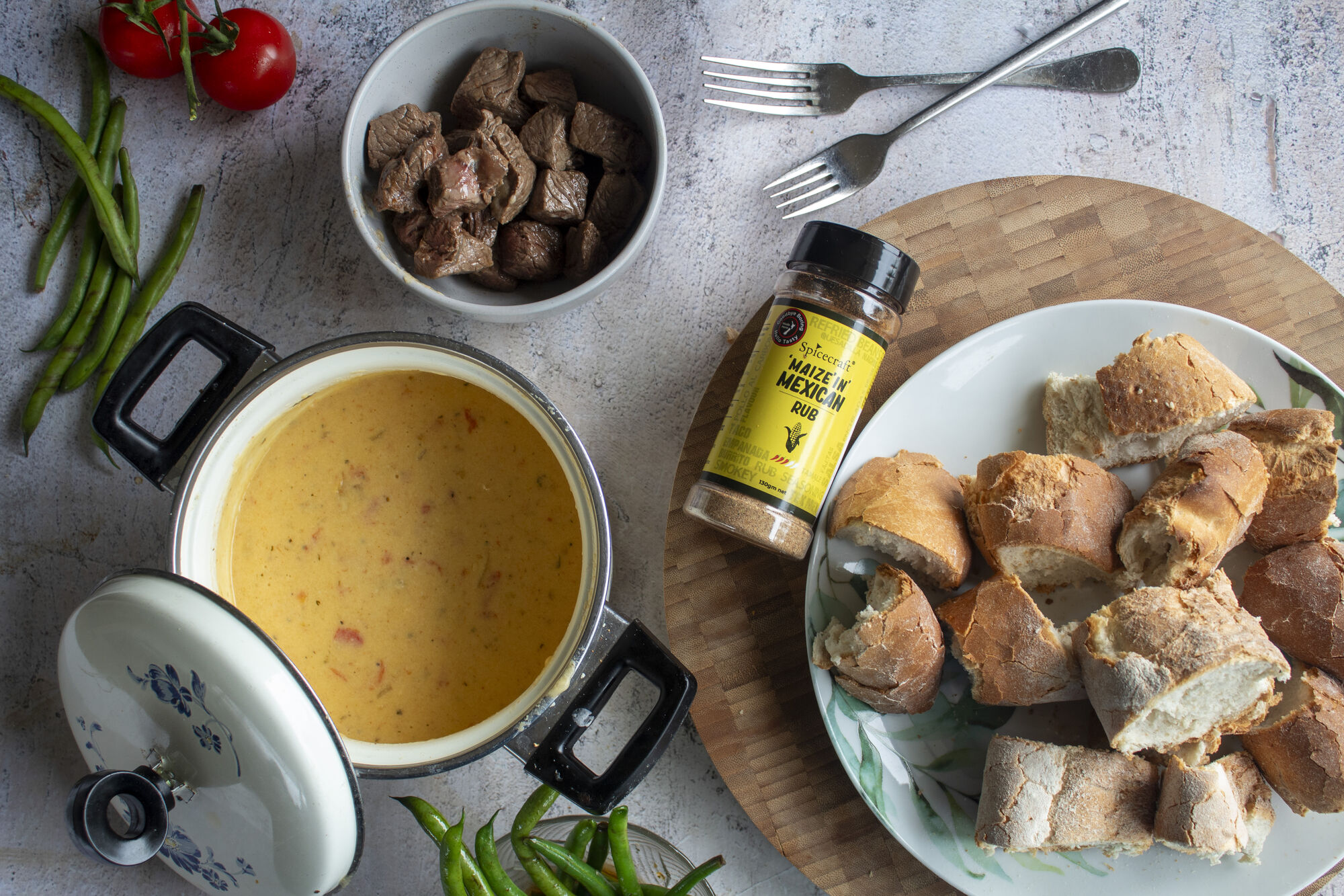 Maize’in Mexican Queso Fundido with Steak Bites and Grilled Vegetables